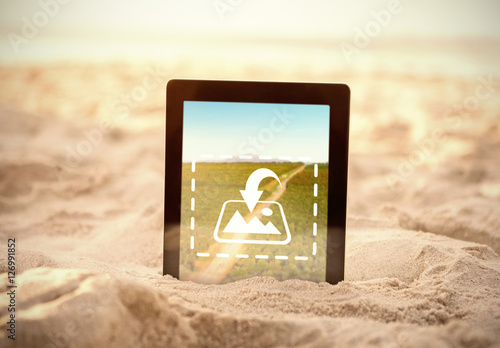 Tablet Stuck in the Sand Mockup