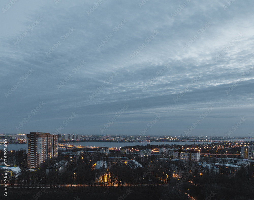 Night Voronezh city from the roof. Blue sky, night lights