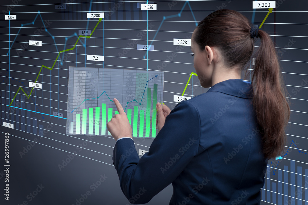 Businesswoman in online stock trading business concept Businesswoman in online stock trading business concept