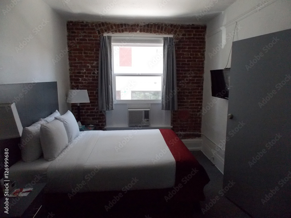 Fototapeta premium Bedroom with Brick Wall