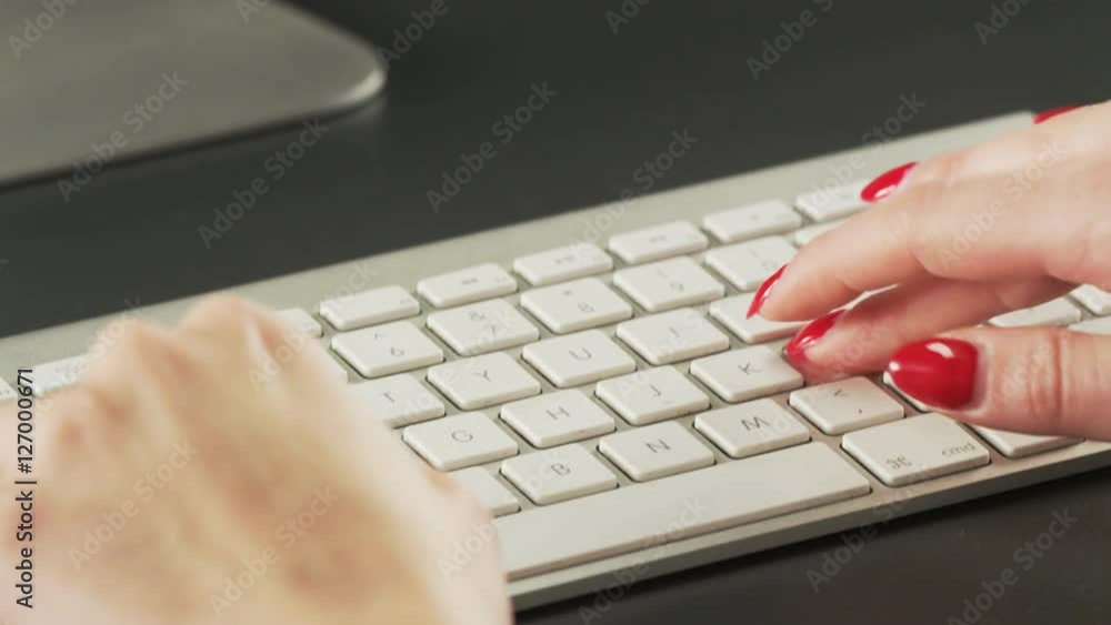 Woman Typing on a Keyboard and Making Gestures Woman Typing on a Keyboard and Making Gestures