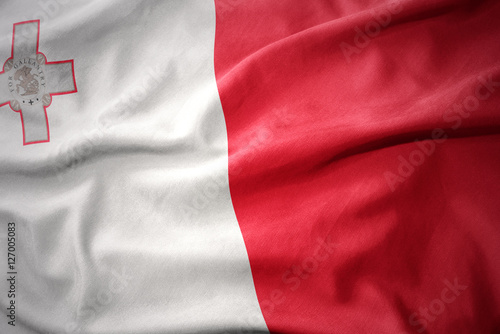 Photography waving colorful flag of malta.