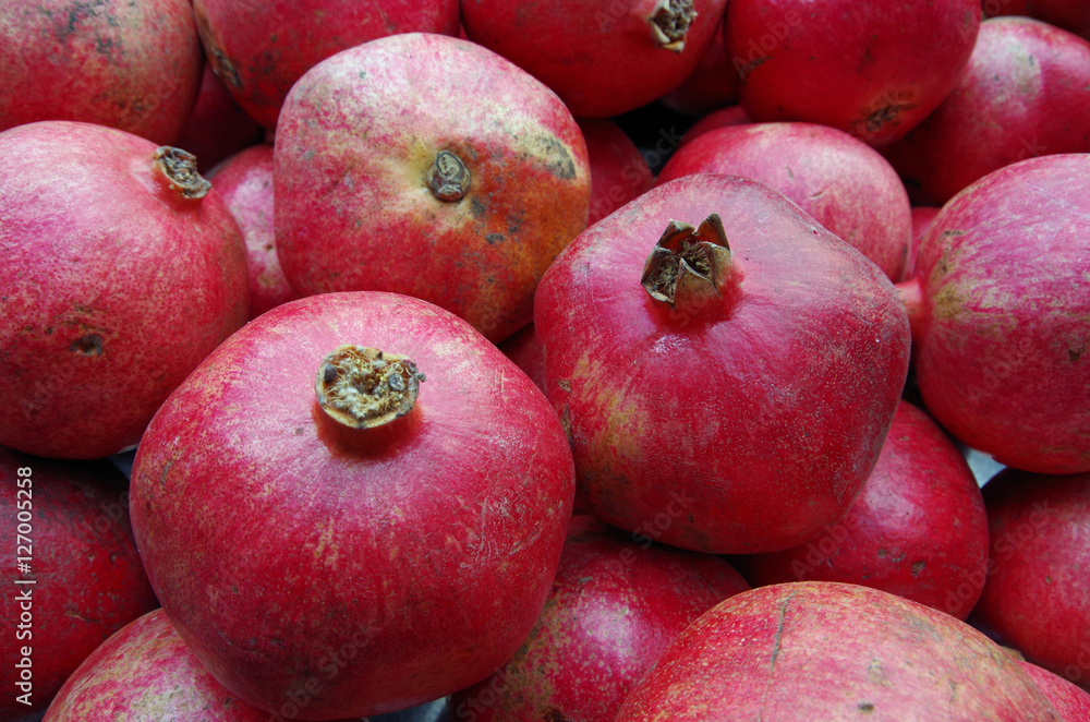 Pomegranates pile close up Pomegranates pile close up