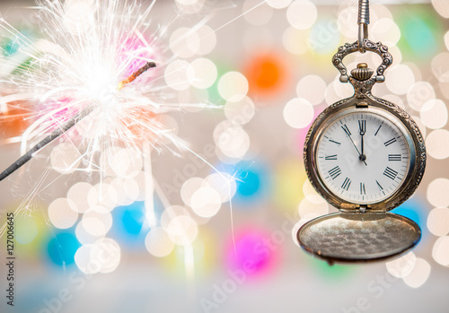 New year clock on abstract background