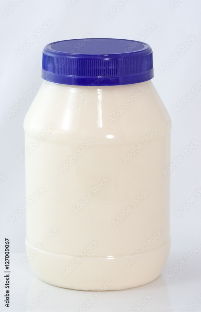 Plastic jar of mayonnaise. No Label. Vertical. Plastic jar of mayonnaise. No Label. Vertical.