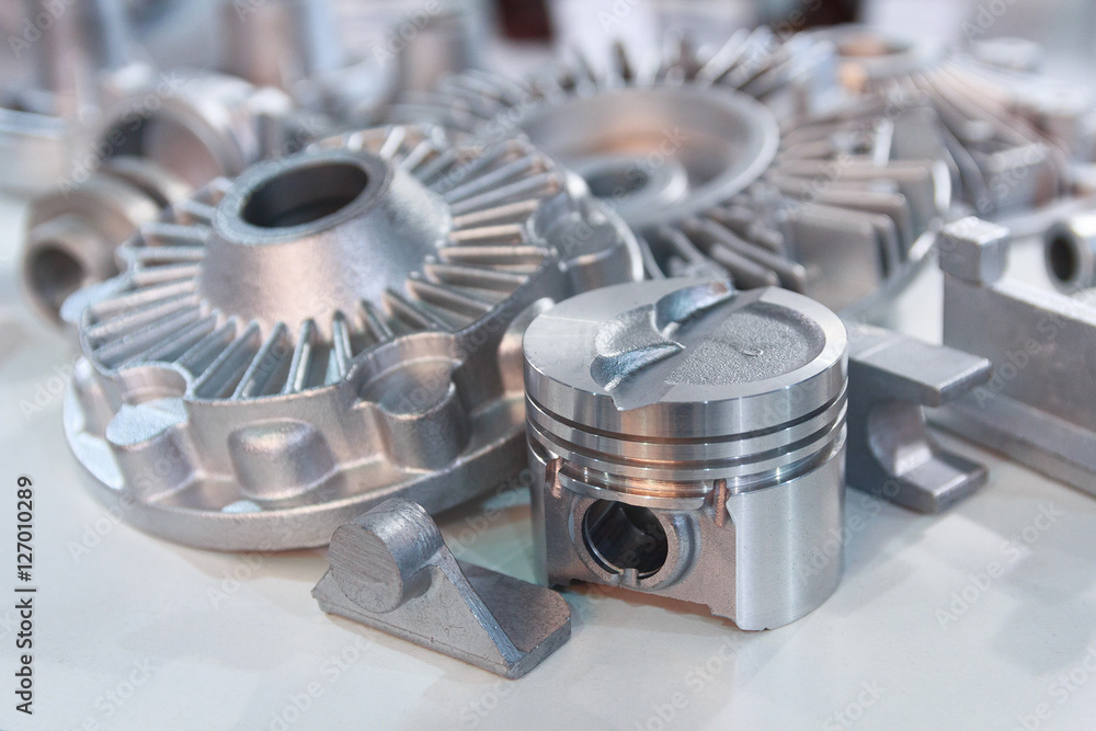 Metal products made by casting techniques closeup. Industry Metal products made by casting techniques closeup. Industry