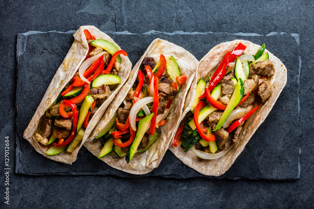 Ταπετσαρία Mexican pork tacos with vegetables. Top view