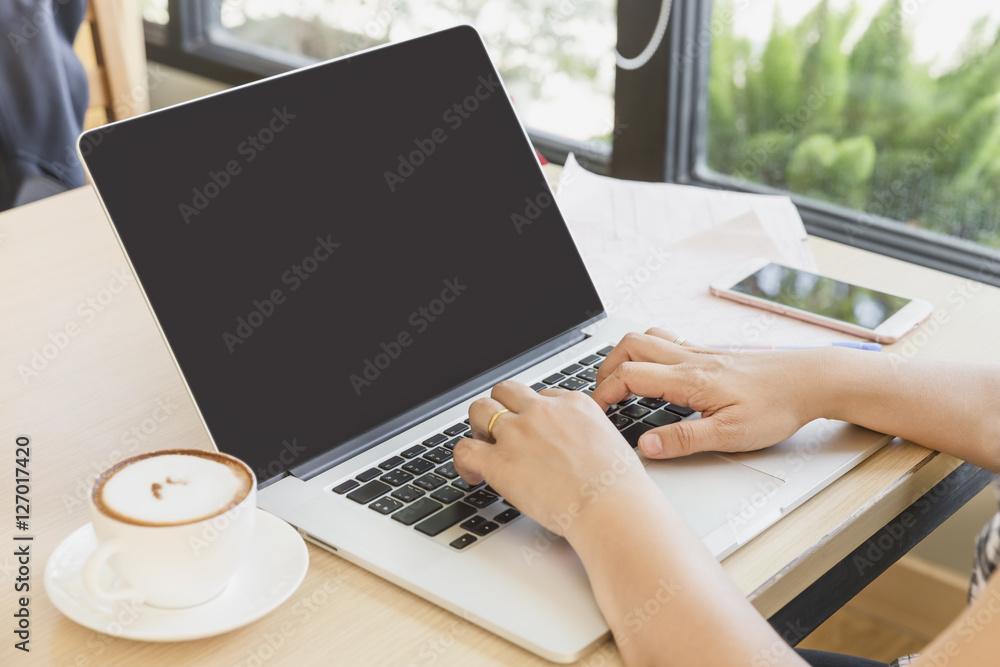 Drinking coffee, surfing internet Drinking coffee, surfing internet