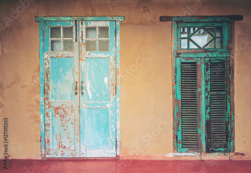 Vintage style old aged house door and window