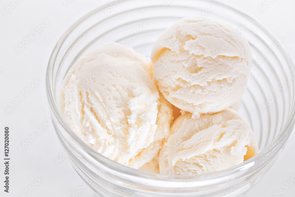 Vanilla sundae ice cream in cup on white background Vanilla sundae ice cream in cup on white background