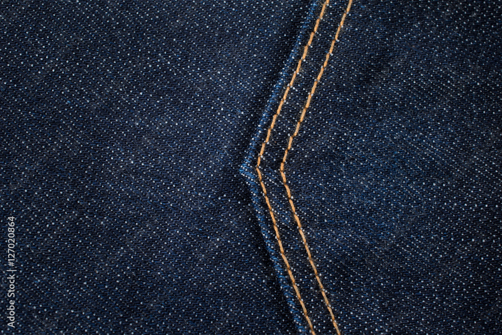 Jeans texture. Dark blue denim with macro style. Vintage fashion Jeans texture. Dark blue denim with macro style. Vintage fashion