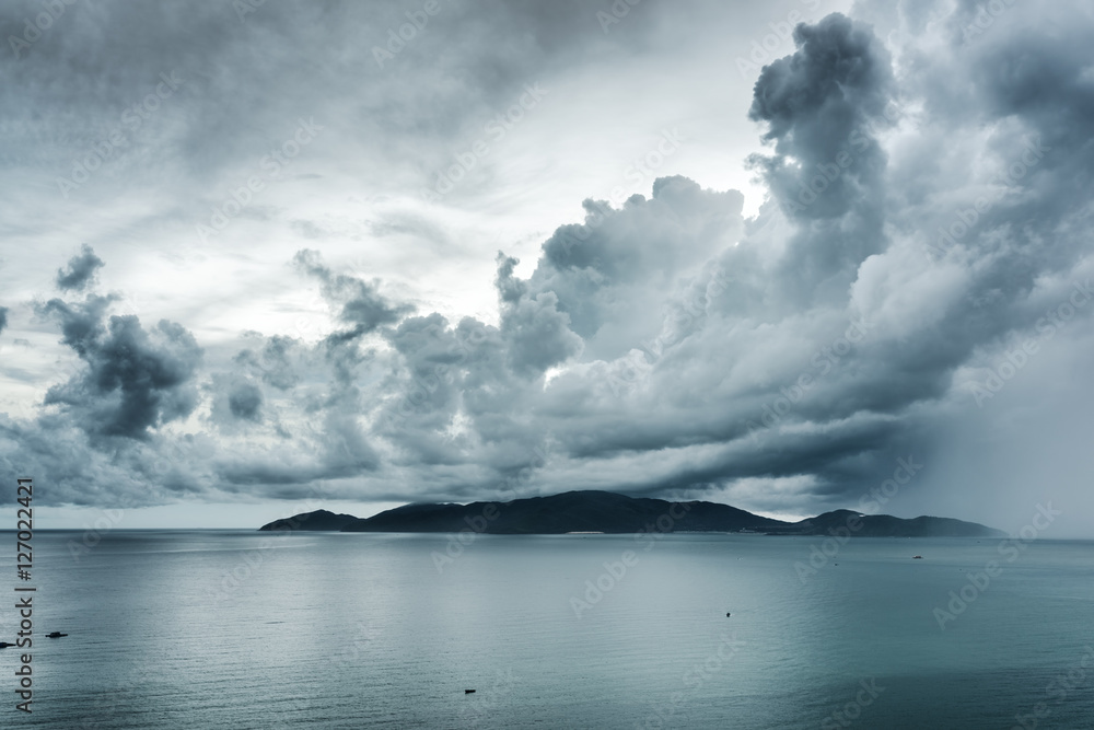 Scenic seascape with dramatic stormy sky. Nha Trang Bay, Vietnam