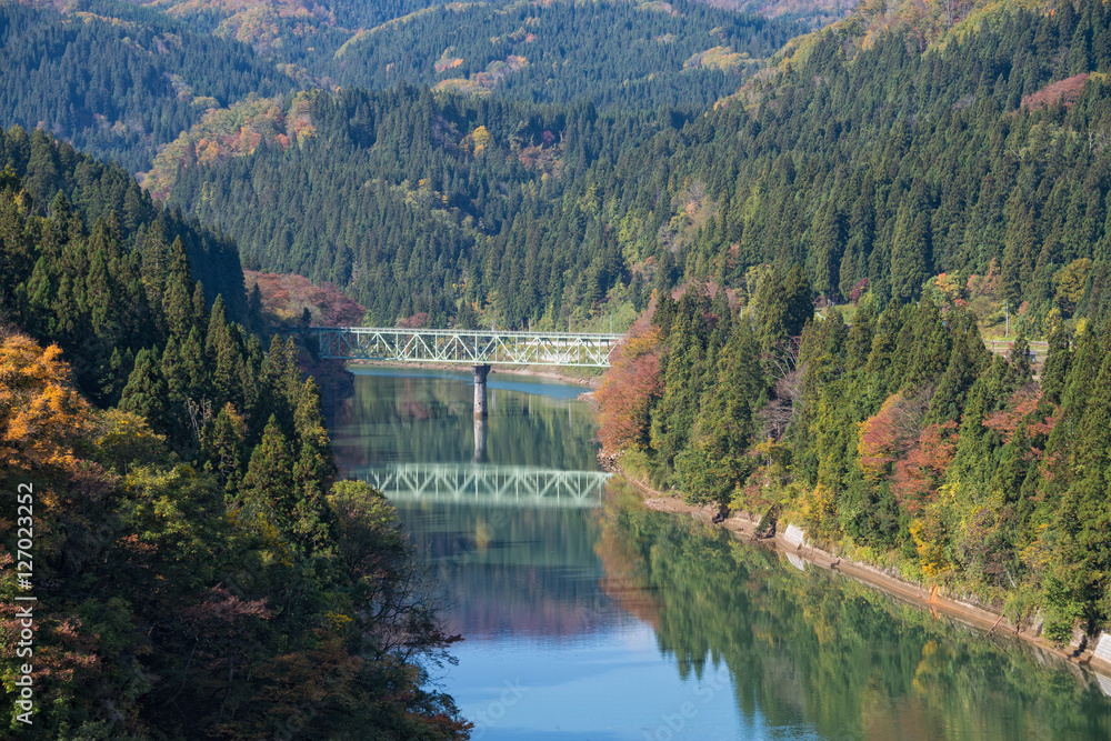 Tadami river and bridge in autumn season at Fukushima, Japan. Stock