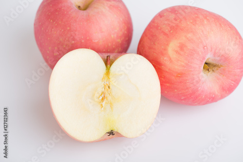 Fresh red apples on white background
