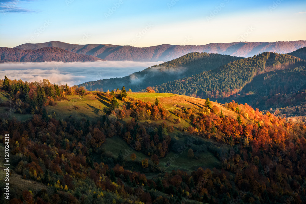 foggy and hot sunrise in Carpathian mountains