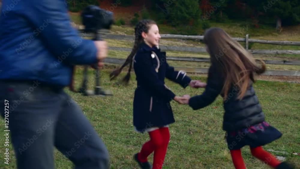 Man shoots with videographer stedikamom little girls whirling in nature Man shoots with videographer stedikamom little girls whirling in nature