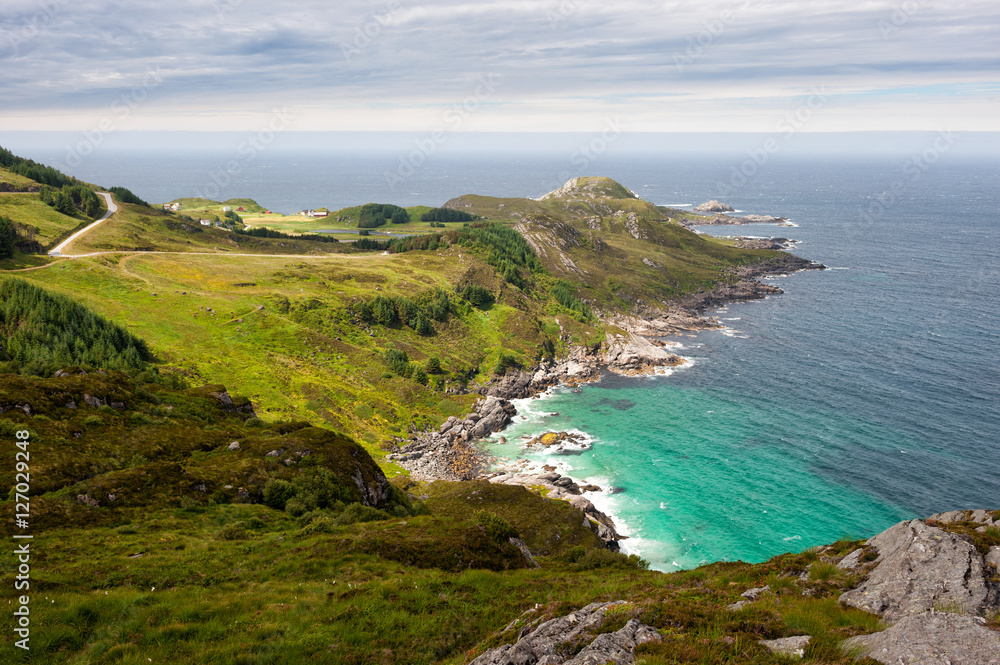 Sea shore landscape, view from the hill to lagoon with turquoise water and sea, Vagsoy island, Norway