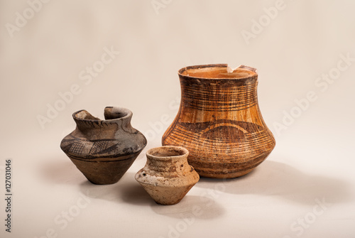 Ancient pottery Cucuteni culture (Trypillya) on a light background in studio