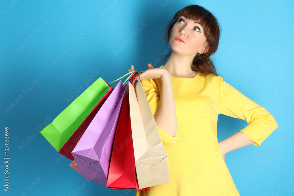 Super sale, shopping, discount, fashion concept:  woman with many shopping bags  