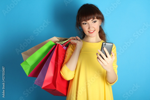 Super sale, shopping, discount, fashion concept: woman with many shopping bags 