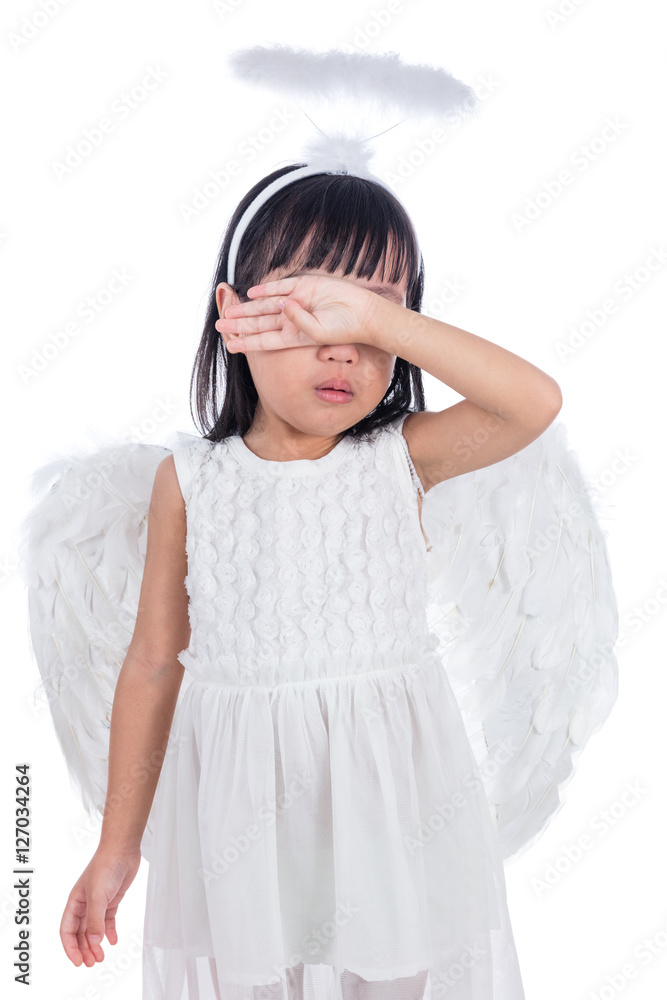 Crying Asian Chinese little girl wearing angel custome Crying Asian Chinese little girl wearing angel custome