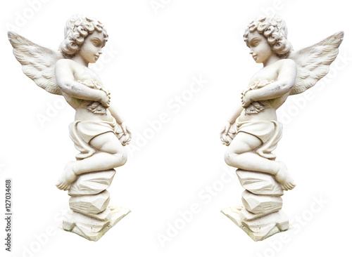 Statue of two angels with flowers isolated on white