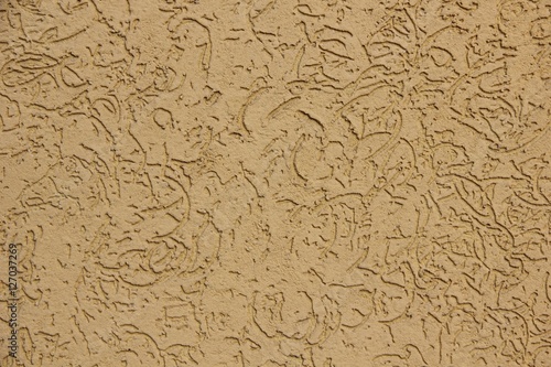 yellow-brown wall texture with abstract pattern