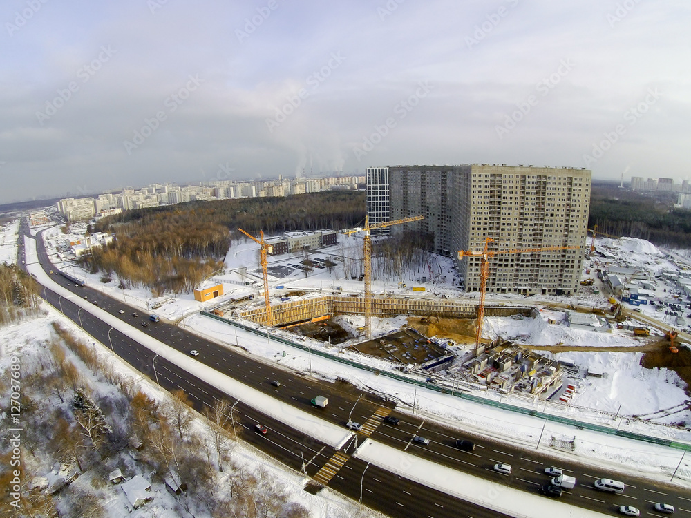 Construction site in the city aerial view at winter