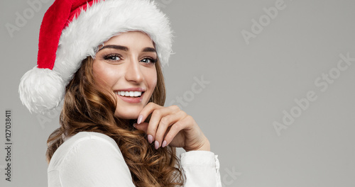Beautiful female model wear santa hat