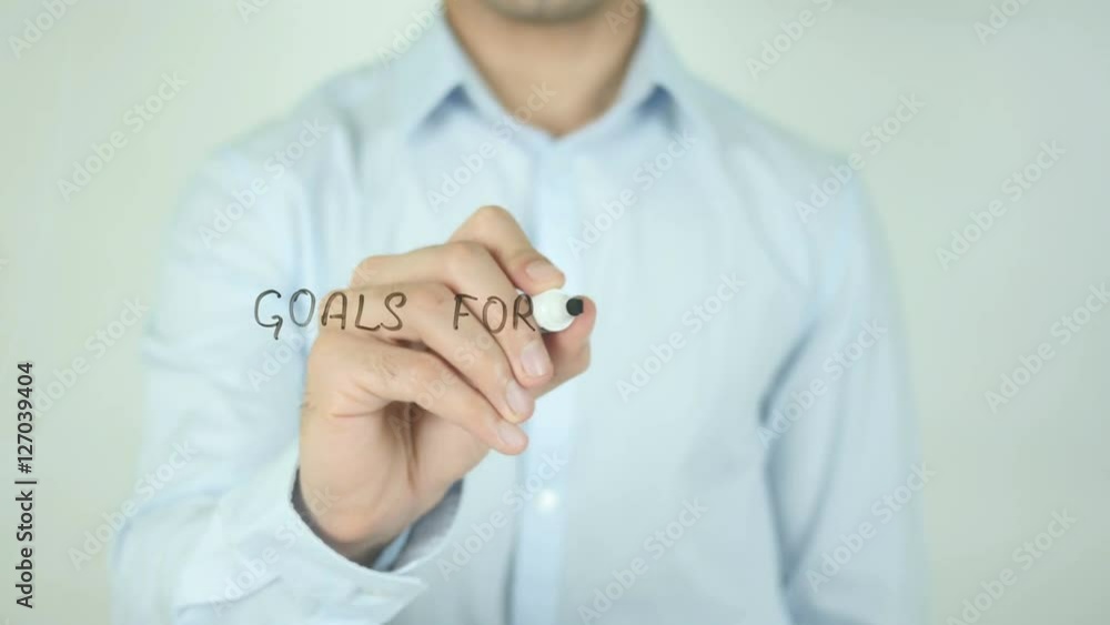 Goals for 2018, Man Writing on Screen Goals for 2018, Man Writing on Screen