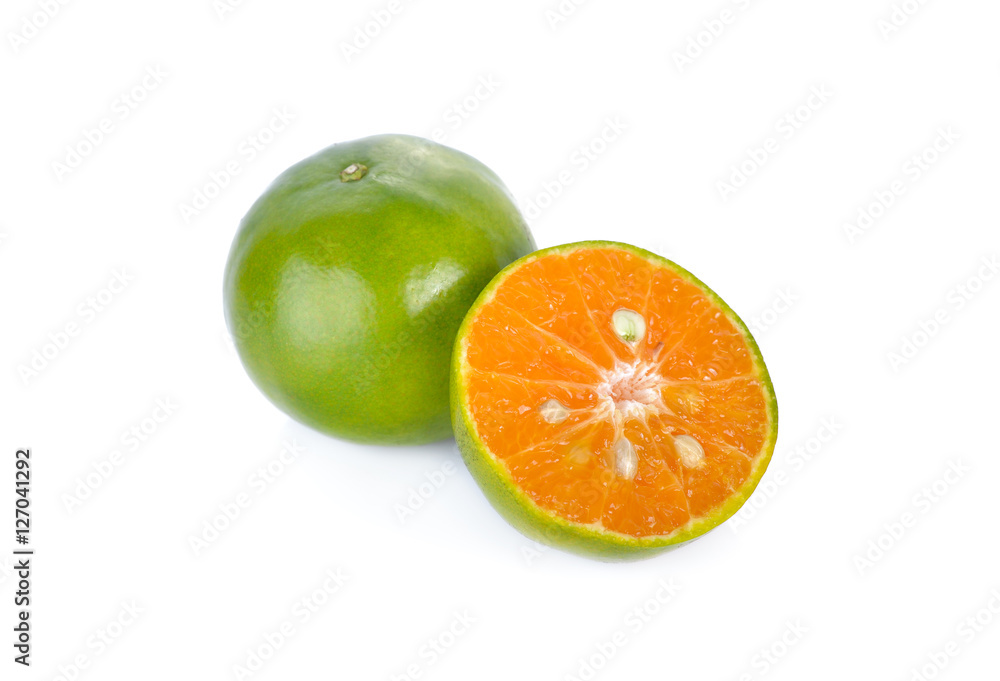 whole and half cut orange on white background whole and half cut orange on white background
