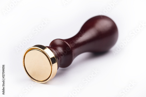 Obraz na płótnie personal blank stamp tool with wooden handle on white