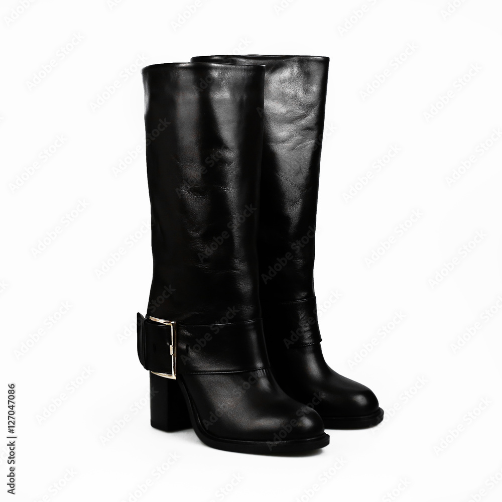 female black boots over white female black boots over white
