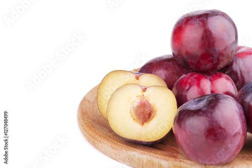 Group of plum and a half  on white background