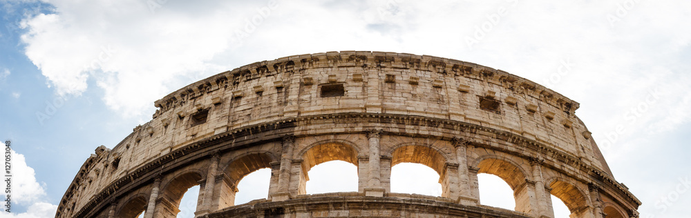 Panoramic fragment of Colosseo in Rome, Lazio region, Italy. Panoramic fragment of Colosseo in Rome, Lazio region, Italy.