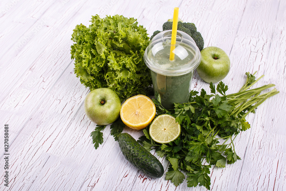 healthy smoothie with green vegetables and fruit lie on the tabl healthy smoothie with green vegetables and fruit lie on the tabl