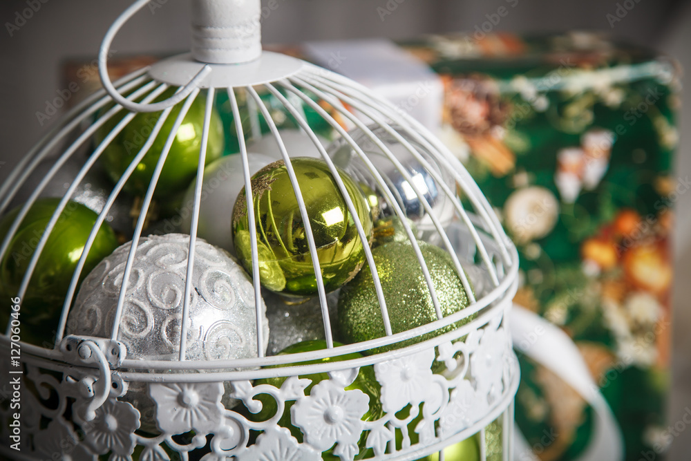 Fototapeta premium Gift present and green christmas balls. New Year decoration.