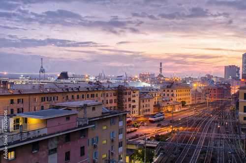 An intimate and at the same time grand view of the city of Genoa  Italy  during the blue hour in the evening