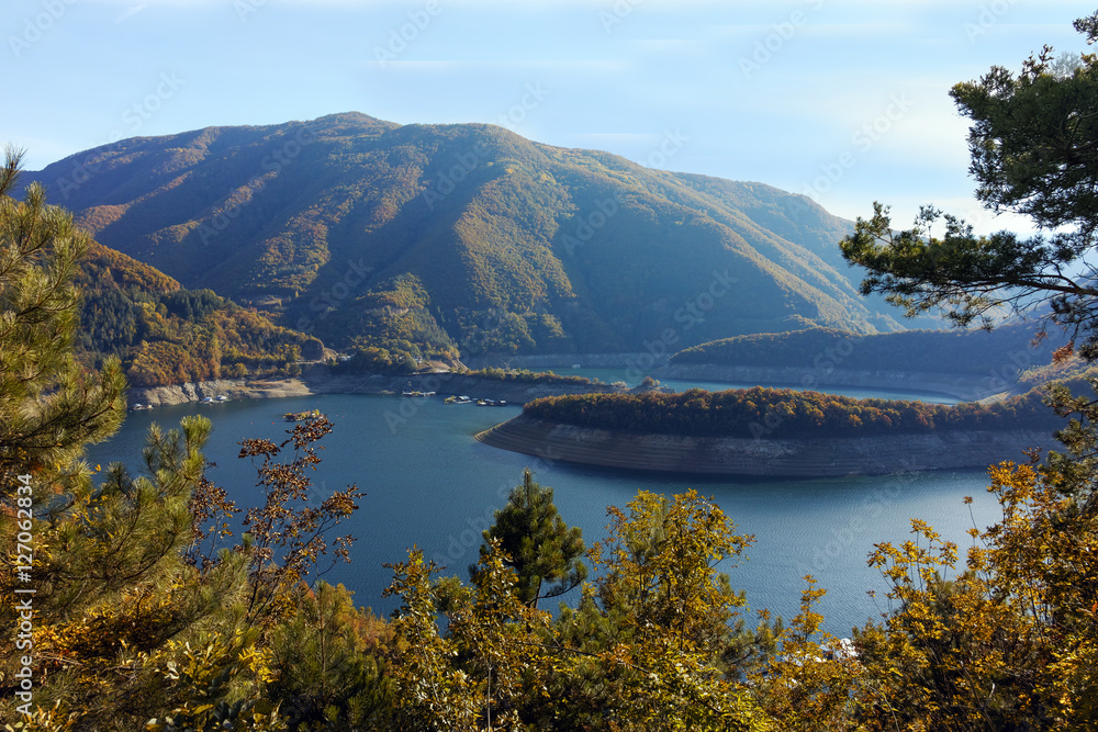 Autumn landscape of forest around Vacha (Antonivanovtsy) Reservoir, Rhodopes Mountain, Bulgaria