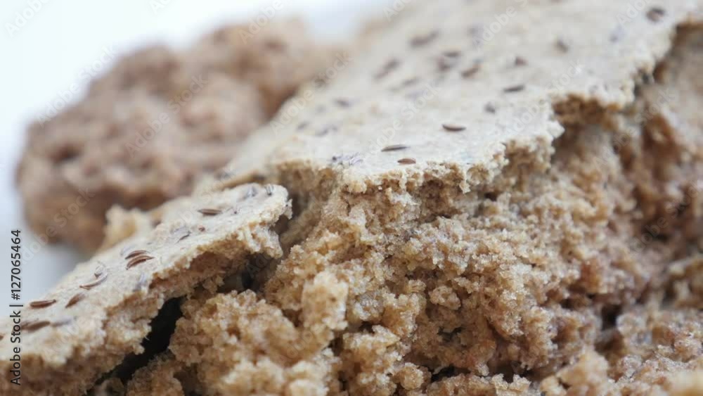 Panning on tasty fresh dark brown staple food served after baking 4K 2160p 30fps UltraHD footage - Slow pan on bread crust and inside made from full healthy grain and barley 3840X2160 UHD video Panning on tasty fresh dark brown staple food served after baking 4K 2160p 30fps UltraHD footage - Slow pan on bread crust and inside made from full healthy grain and barley 3840X2160 UHD video