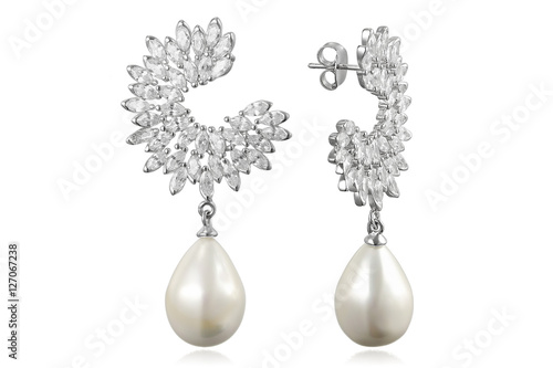 Fotografía Silver earrings on white background