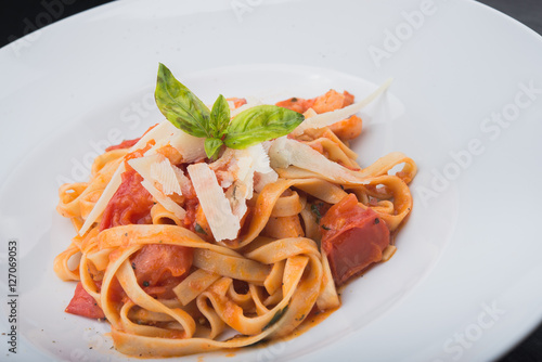 italian pasta with meat, tomato and cheese