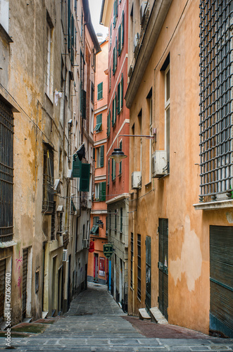 A typical narrow street in the old part of the ancient city of Genoa, Italy © NRoytman Photography