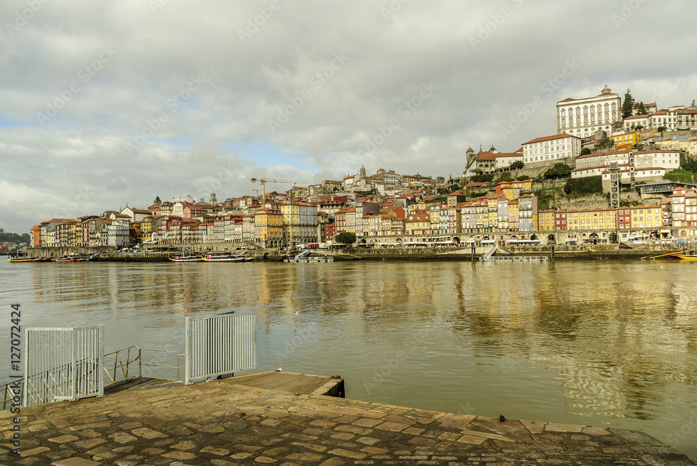 sight of the historical center of Oporto with the pier in the river Douro in Portugal. 