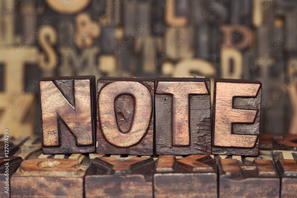 wooden NOTE concept