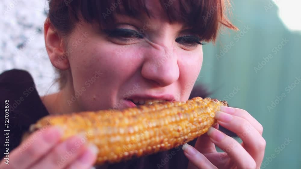 4k Food Shot of Woman Eating Grilled Corn 4k Food Shot of Woman Eating Grilled Corn