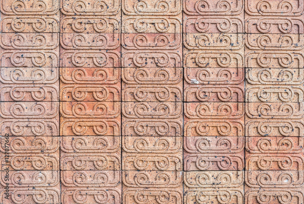 Closeup brick pattern at old brown brick stone wall textured background Closeup brick pattern at old brown brick stone wall textured background