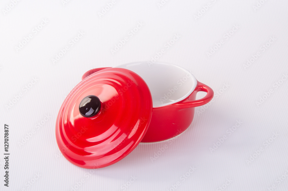 pot or red pot with cover on background. pot or red pot with cover on background.