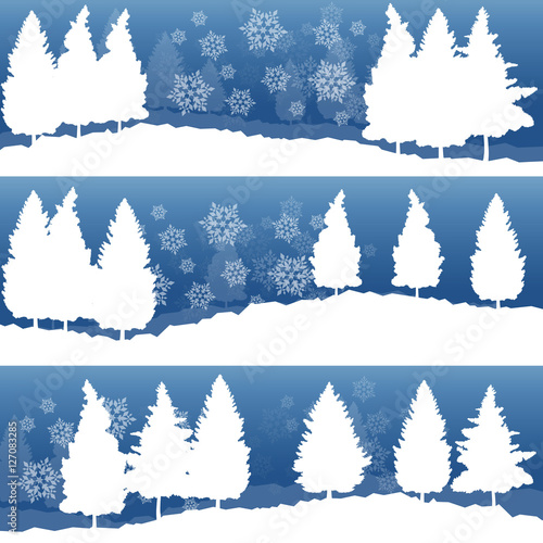 Christmas background with winter white snowy fir trees and falli