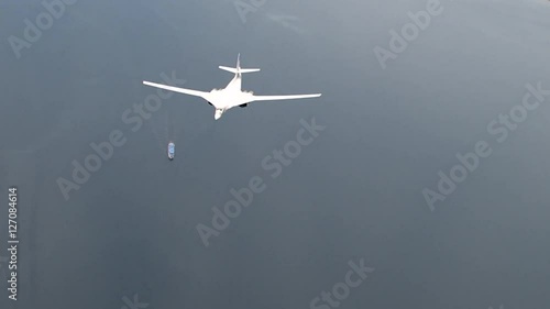 Russian bomber Tu-160 over the ship